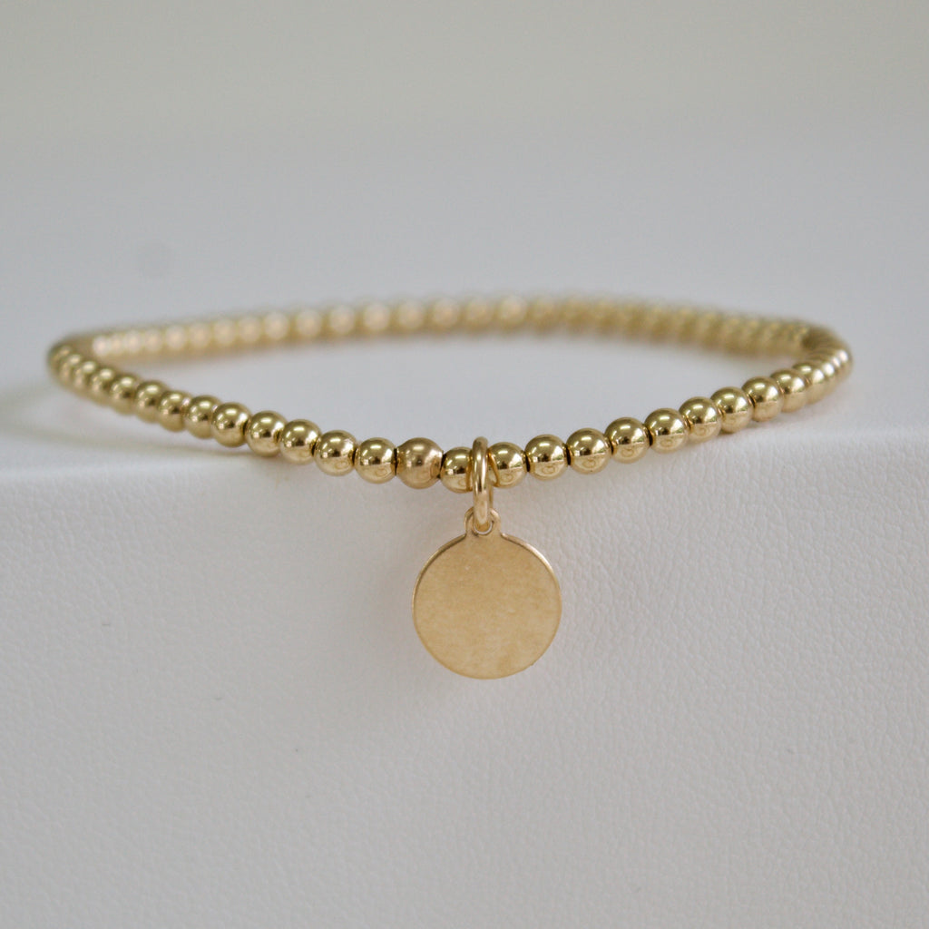 Gold Bead/Disk Pendant Bracelet